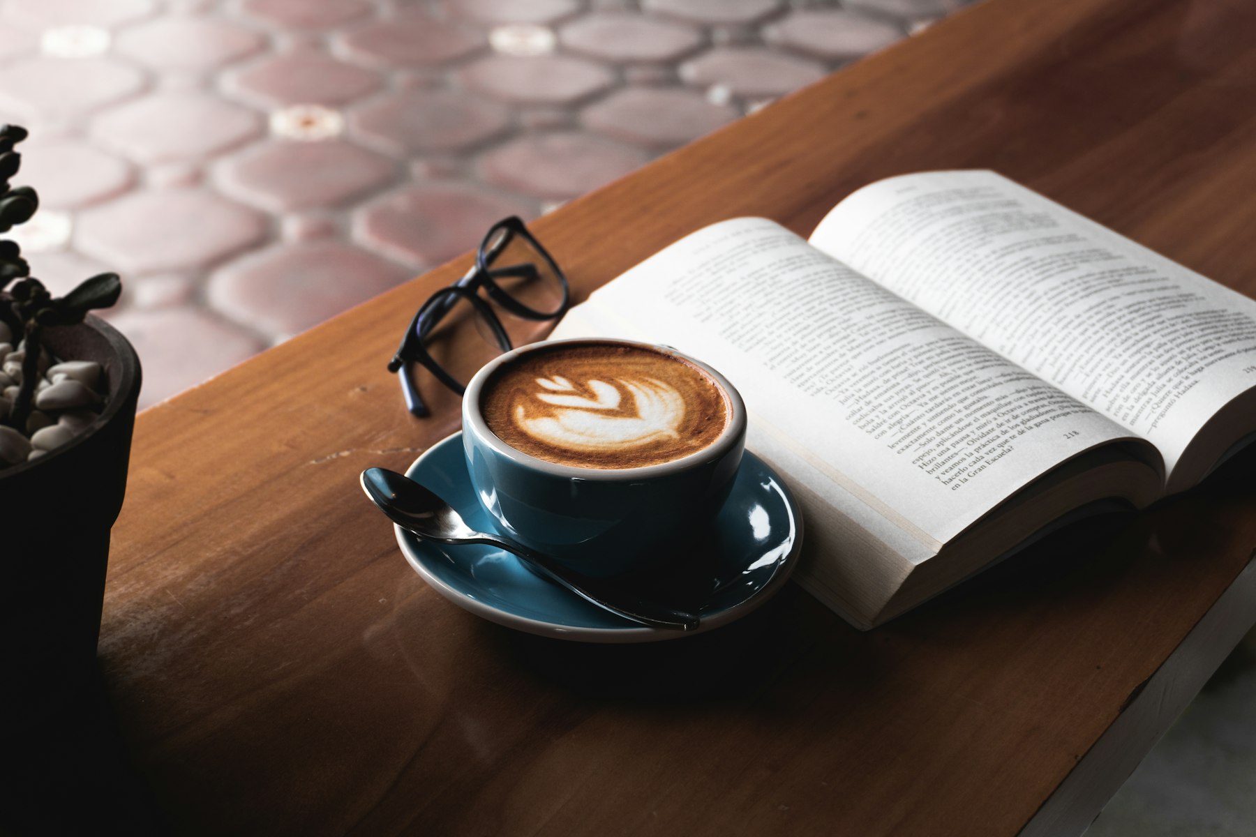 A coffee and an open book